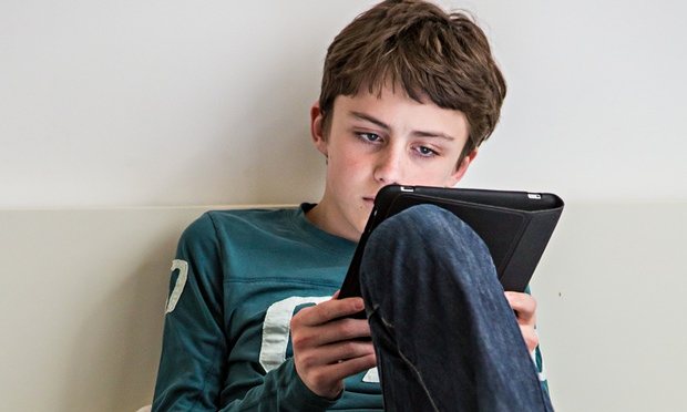 Boy with e-reader